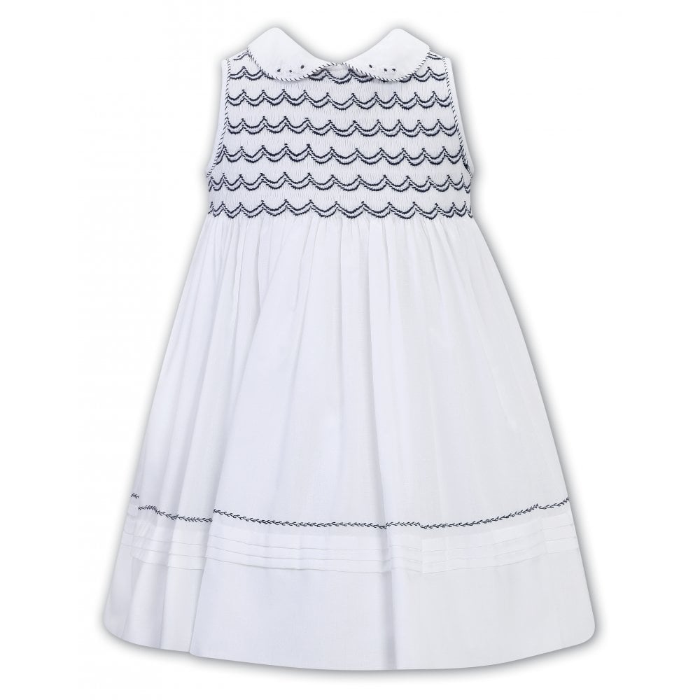 SARAH LOUISE HAND SMOCKED DRESS 013240 WHITE/NAVY 2YRS ONLY   SALE